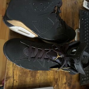 Jordan 6 Metallic Black and Gold